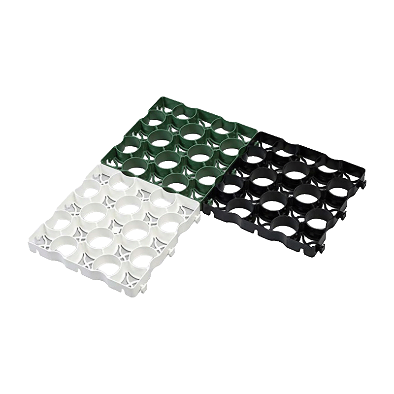 Three Easygrid tiles in green, white, and black on a white background