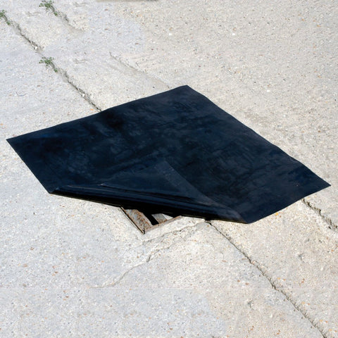 Floorsaver Neoprane Drain Cover over a drain