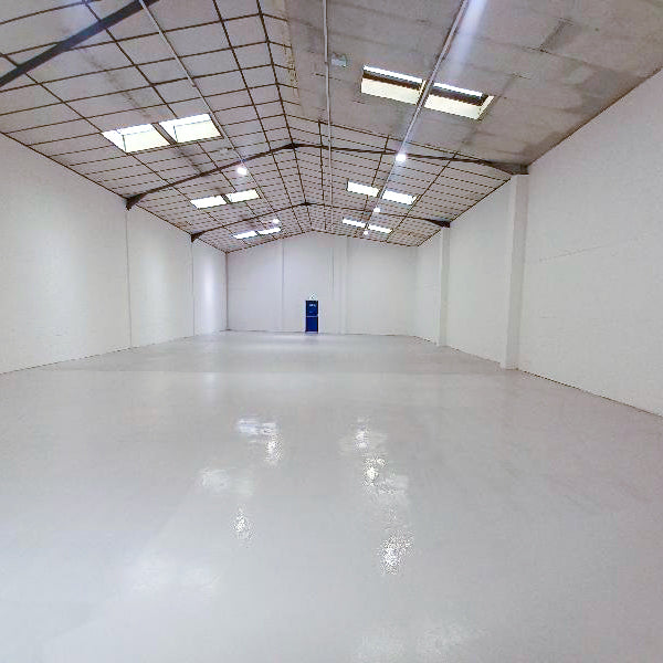 Light grey epoxy floor paint finish on concrete
